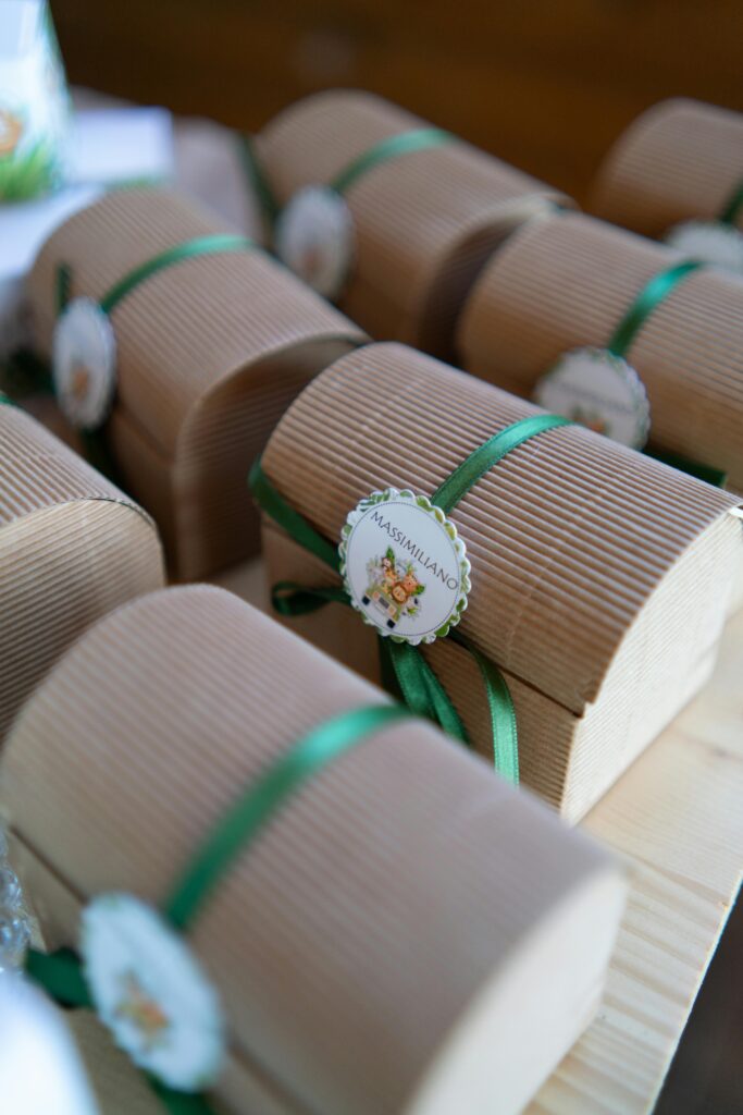 pexels-photo-19522978-19522978 Corrugated boxes tied with green ribbons, ideal for gifts and special occasions.